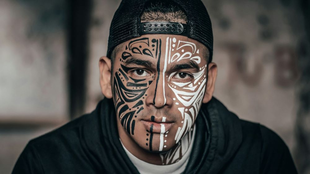 Man with black and white face paint