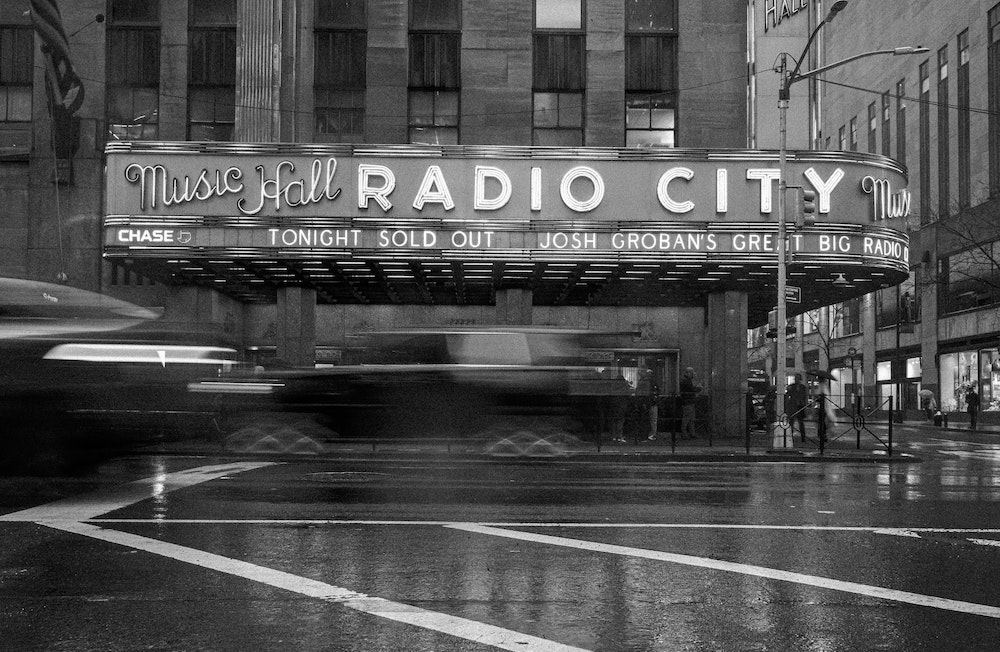 Black and white photo of a music hall called Radio City. 