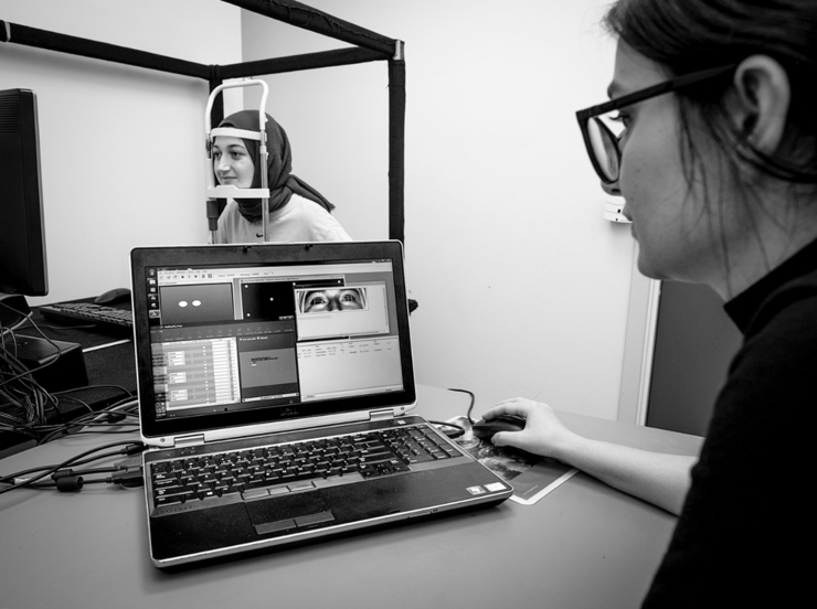 Researcher analysing a participant&#39;s eye movements.
