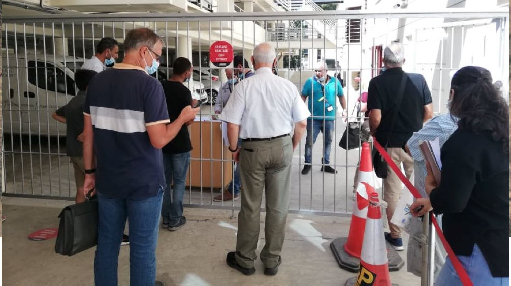 People standing in line for the immigration department in Nicosia