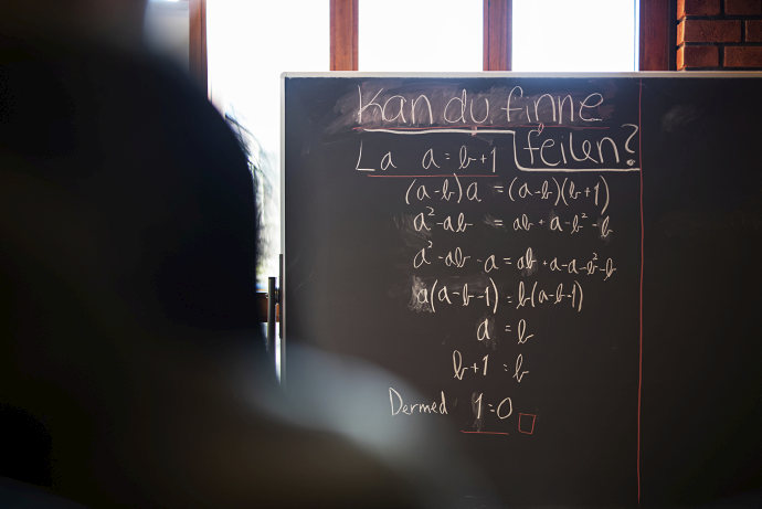 Handwriting on a blackboard.